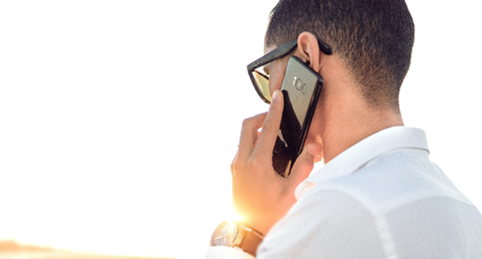 Man on phone to a claims management company